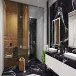 A contemporary bathroom featuring black marble walls and floor, complemented by a porcelain slab.