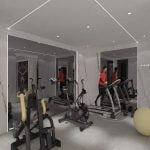 A gym room with exercise equipment and mirrors, featuring a porcelain slab.